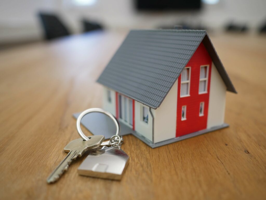 Model of a House and House Keys Photo